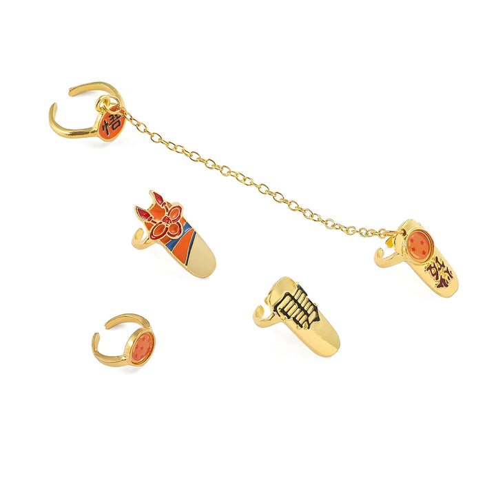 Quatre bagues en métal doré sur le thème de Dragon Ball Z. Sur la première bague, on peut voir le kanji "Go" qui signifie "force". Sur la deuxième bague, on peut voir le kanji "Kame" qui signifie "tortue". Sur la troisième bague, on peut voir le kanji "Sennin" qui signifie "ermite". Sur la quatrième bague, on peut voir le kanji "Goku" qui est le nom du personnage principal de Dragon Ball Z. Les bagues sont reliées entre elles par une chaîne.,BA-1848485220