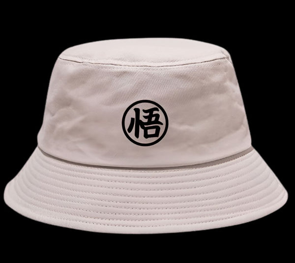 Un chapeau beige avec le symbole de Goku en noir.,BO-6460777039