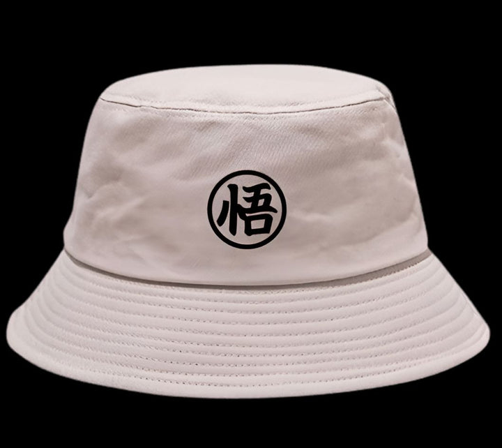 Un chapeau beige avec le symbole de Goku en noir.,BO-6460777039