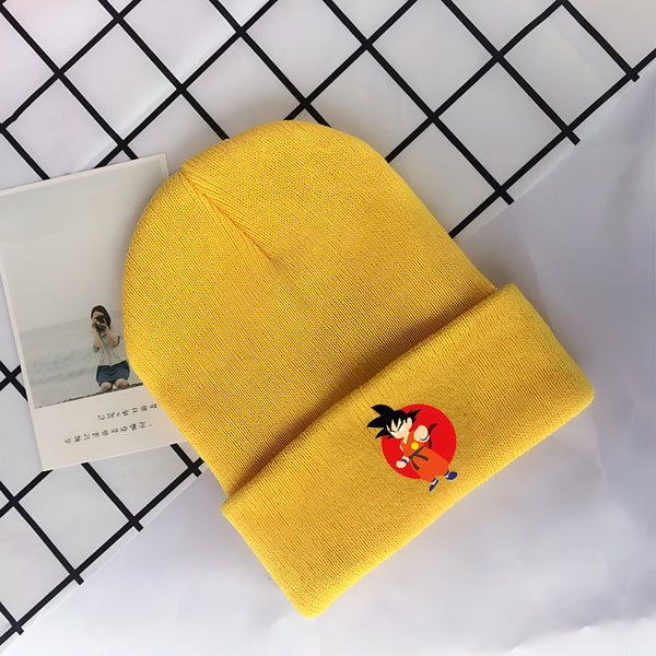Un bonnet jaune avec un personnage de dessin animé brodé dessus.,BO-4764895714,BO-5983879995