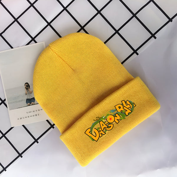Un bonnet jaune avec le logo de Dragon Ball Z brodé dessus.,BO-8260688263,BO-5057827693