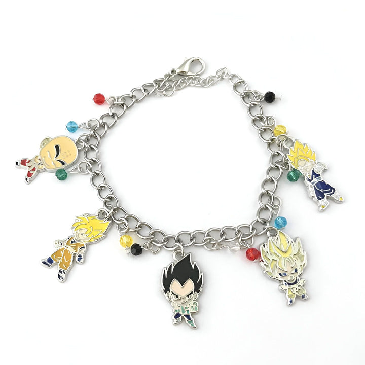 Le bracelet est en métal argenté et comporte des breloques en émail colorées représentant les personnages de la série télévisée Dragon Ball Z.,BR-1041779402