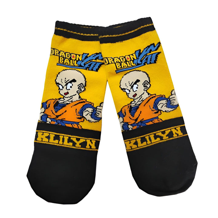 Une paire de chaussettes jaunes et noires avec un motif de Dragon Ball Z.,CH-5118223377