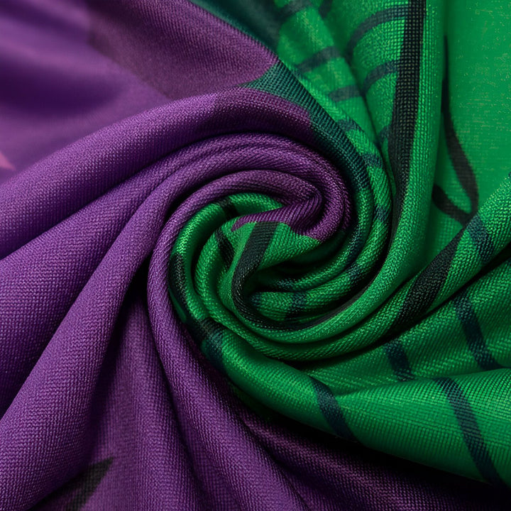 Une image d'un tissu vert et violet froissé.,DS-3671195975,DS-4555300920,DS-158710170X,DS-5332556357,DS-5263042639,DS-3921312159