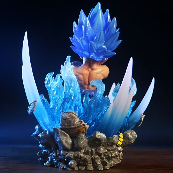 Une figurine de Son Goku, un personnage de la série animée Dragon Ball Z. Il est représenté en train de se téléporter, entouré d'un halo bleu. La figurine est en résine et mesure environ 20 cm de haut.,FI-632171478X