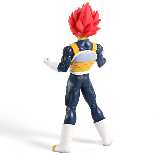 Une figurine de Vegeta, un personnage de Dragon Ball Z. Il est vêtu d'une combinaison bleue et jaune et a les cheveux rouges. Il est en position de combat.,FI-2885430907