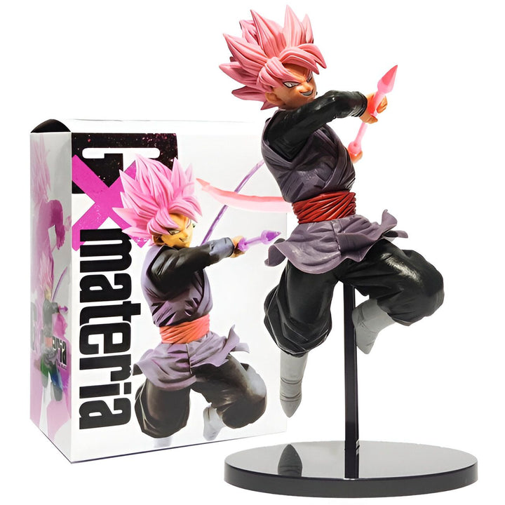 Une figurine de Son Goku, un personnage de Dragon Ball Z. Il est représenté avec ses cheveux roses et sa tenue noire. Il est en position de combat, avec une épée dans chaque main. La figurine est vendue dans une boîte.,FI-5332510535