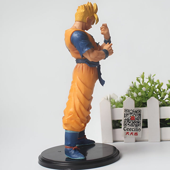 Une figurine de Son Gohan, un personnage de la série animée Dragon Ball Z. Il est représenté avec ses cheveux blonds hérissés, vêtu de son costume de combat orange et bleu. Il est en position de combat, le poing droit levé.,FI-5855664635