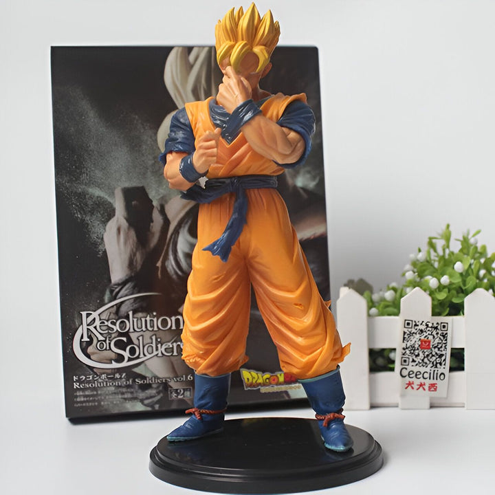 Une figurine de Son Goku, un personnage de la série animée Dragon Ball Z. Il est vêtu de son costume orange et bleu et est en position de combat.,FI-5855664635