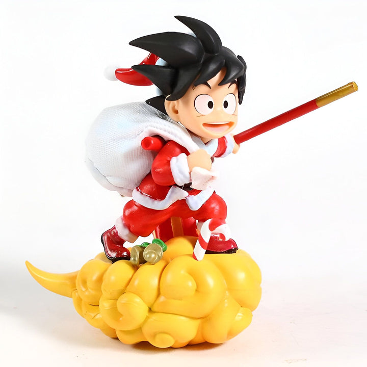 Une figurine de Son Goku, un personnage de Dragon Ball Z, portant un costume de Père Noël et chevauchant un nuage magique.,FI-2294406850