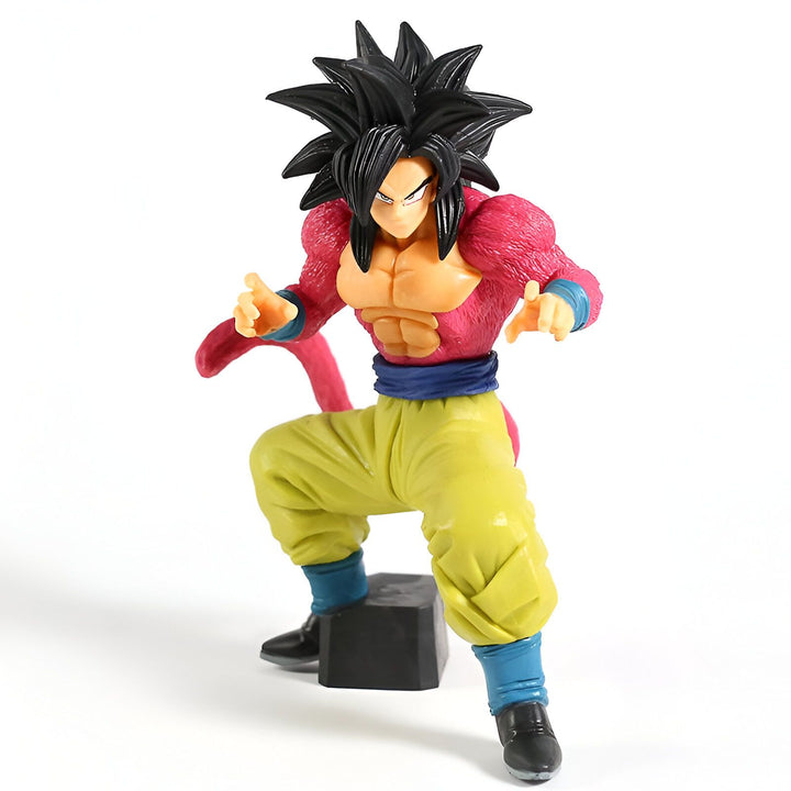 Une figurine de Son Goku, un personnage de Dragon Ball Z. Il est représenté avec ses cheveux noirs et rouges, sa combinaison orange et bleue, et sa ceinture bleue. Il est en position de combat, le poing droit en avant et le gauche en arrière.,FI-5993988037