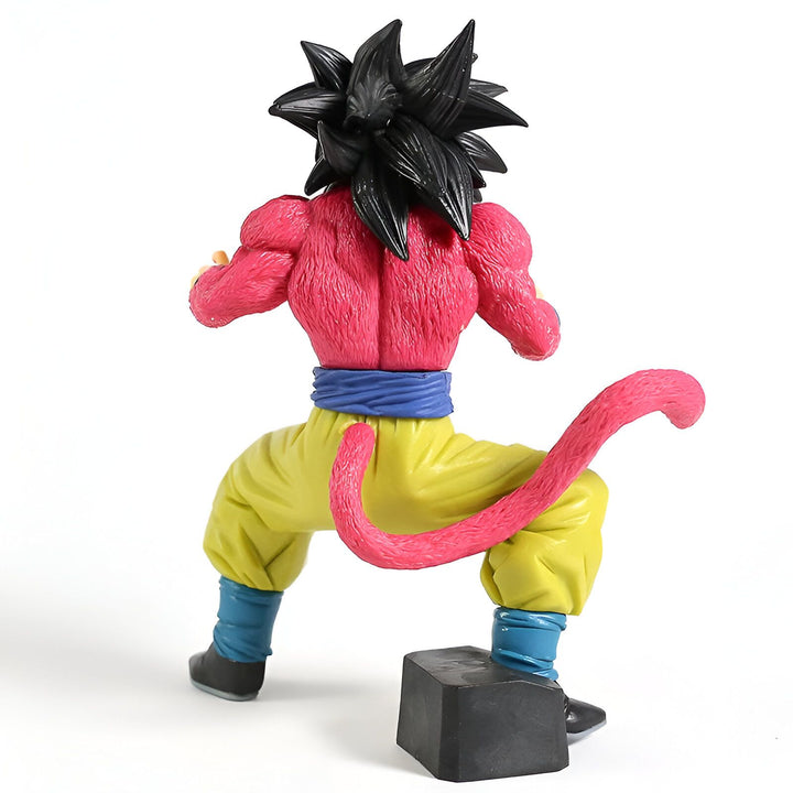 Une figurine de Son Goku, un personnage de Dragon Ball Z. Il est représenté avec ses cheveux noirs et roses, sa peau rose et sa combinaison jaune et bleue. Il est en position de combat, le poing droit en avant et le gauche en arrière.,FI-5993988037