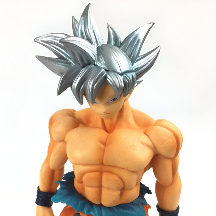 Une figurine de Son Goku, un personnage de la série Dragon Ball. Il est représenté avec les cheveux argentés et le regard déterminé. Il porte une tenue orange et bleue.,FI-6956439220