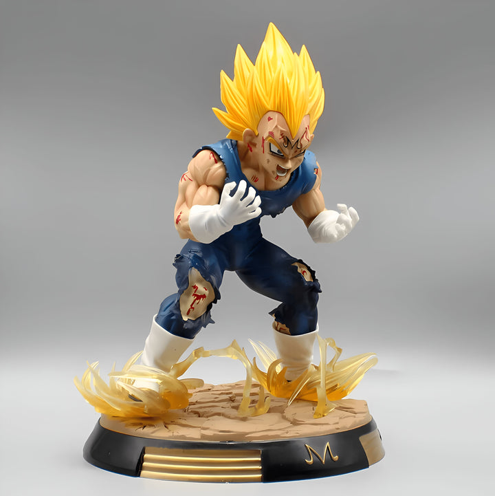 Une figurine de Vegeta, un personnage de la série Dragon Ball Z. Il est représenté avec ses cheveux blonds hérissés, sa combinaison bleue déchirée et ses bottes blanches. Il est en position de combat, le poing droit en avant et la paume gauche ouverte. La figurine est posée sur un socle doré.,FI-3778162152