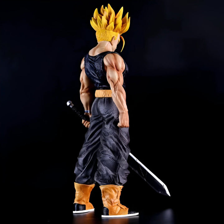 Une figurine de Trunks du futur, un personnage de Dragon Ball Z. Il est vêtu d'un gilet noir et d'un pantalon noir. Il porte une épée à la ceinture et a les cheveux jaunes.,FI-296402930X