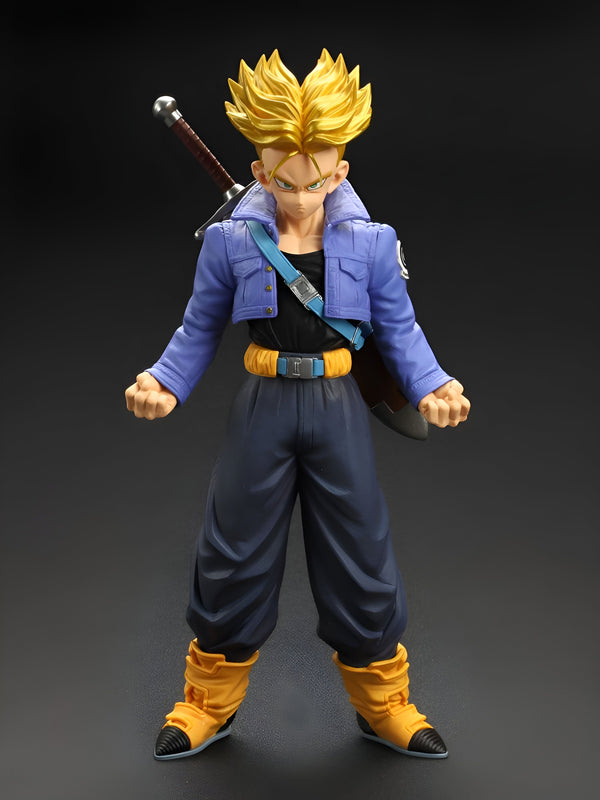 Une figurine de Trunks, un personnage du manga Dragon Ball Z. Il est représenté avec ses cheveux blonds hérissés, sa veste bleue et son pantalon noir. Il tient une épée dans sa main droite.,FI-772317795X