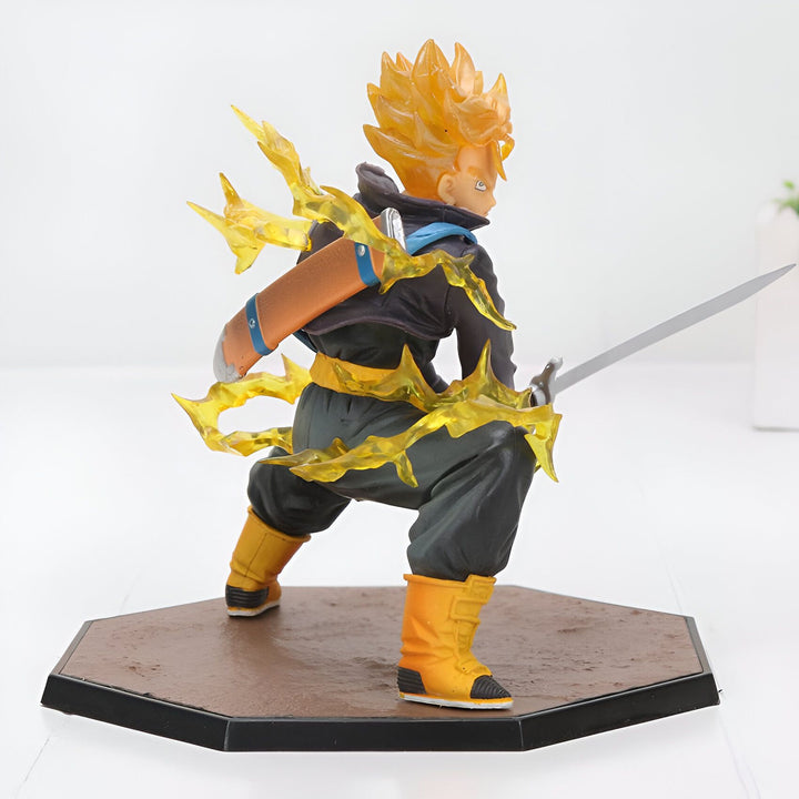 Une figurine de Trunks du futur, un personnage de Dragon Ball Z. Il est représenté avec ses cheveux blonds hérissés, son épée et son regard déterminé. Il est vêtu d'une veste noire et d'un pantalon jaune.,FI-4607500992