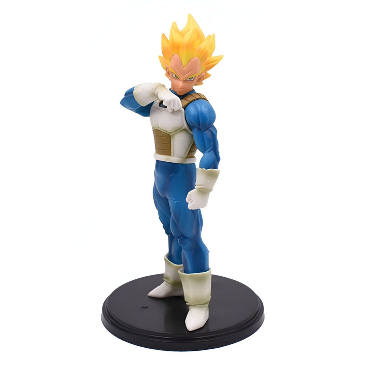 Une figurine de Vegeta, un personnage de la série Dragon Ball Z. Il est vêtu d'une combinaison bleue et jaune et a les cheveux blonds. Il est en position de combat.,FI-2212519990