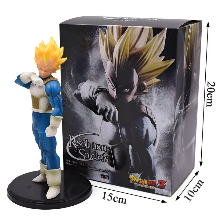 Une figurine de Vegeta, un personnage de la série Dragon Ball Z. Il est vêtu d'une combinaison bleue et jaune et est en position de combat. La figurine est d'environ 15 cm de haut et est vendue dans une boîte.,FI-2212519990