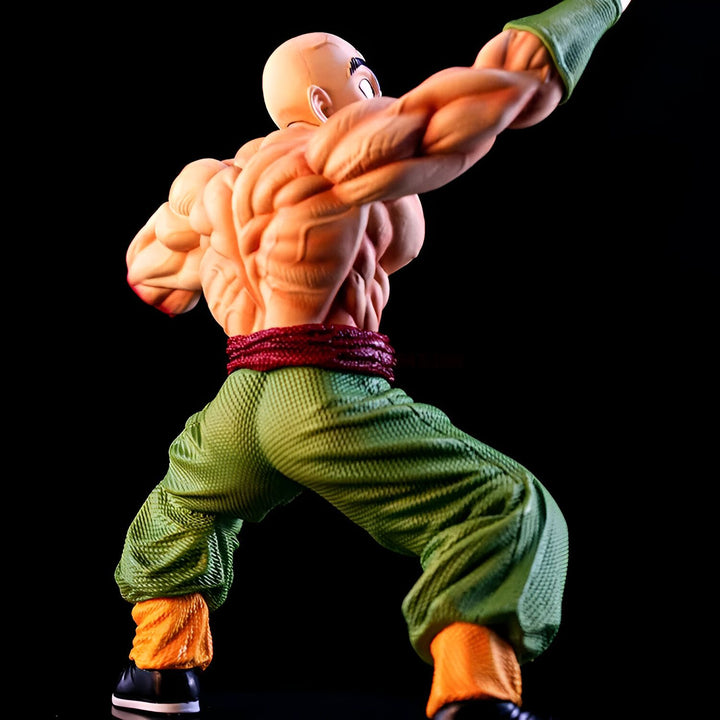 Une figurine de Tenshinhan, un personnage de Dragon Ball Z, est représentée de dos. Il est en position de combat, avec les muscles saillants et les poings serrés. Il porte un pantalon vert et une ceinture rouge.,FI-9826513059