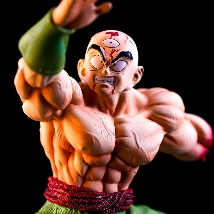 Une figurine de Tenshinhan, un personnage de Dragon Ball Z. Il est représenté avec les cheveux noirs, les yeux bleus et une cicatrice sur le front. Il porte une tenue verte et rouge et est en position de combat.,FI-9826513059