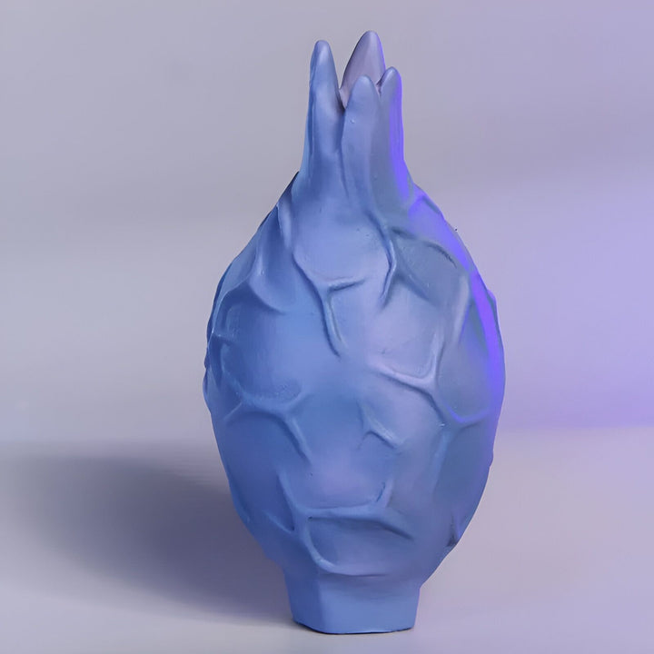 Une image d'un fruit du dragon bleu sur fond gris.,FI-1577601327