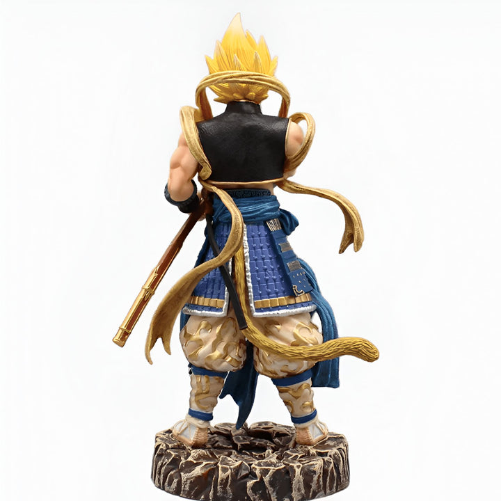 Une figurine de Son Goku, un personnage de la série Dragon Ball Z. Il est vêtu d'un kimono bleu et doré et tient un katana dans sa main droite.,FI-154959074X