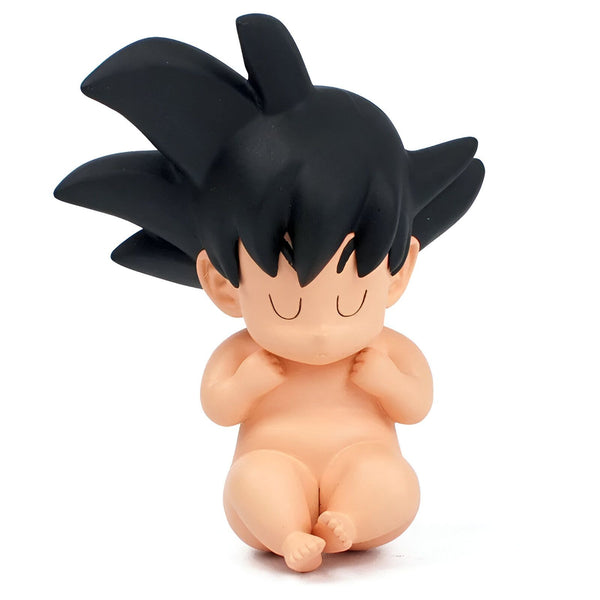Une figurine de Son Goku bébé, un personnage de Dragon Ball Z. Il est assis, les yeux fermés, et porte une couche.,FI-0042073030