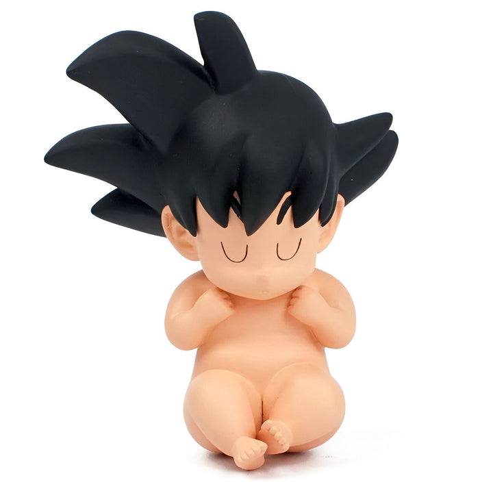Une figurine de Son Goku bébé, un personnage de Dragon Ball Z. Il est assis, les yeux fermés, et porte une couche.,FI-0042073030