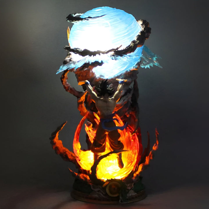 Une figurine de Son Goku en train de charger un Genkidama. La figurine est éclairée par une lumière bleue et orange.,FI-629852438X