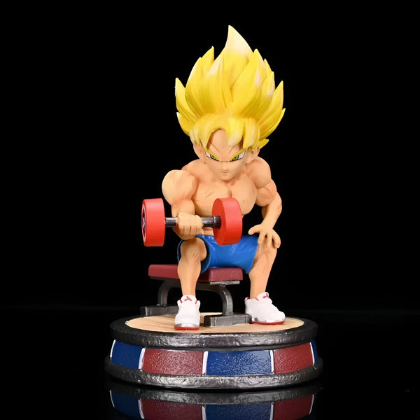 Une figurine de Son Goku, un personnage de Dragon Ball Z, en train de soulever des haltères. Il est assis sur un banc et porte un short bleu et des baskets blanches.,FI-9124101168