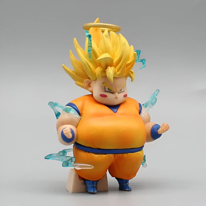 Une figurine en plastique de Son Goku, un personnage de la série animée Dragon Ball Z. Il est représenté avec les cheveux jaunes et les yeux bleus, et porte une combinaison orange et bleue. Il est également entouré d'un halo bleu.,FI-6459962774