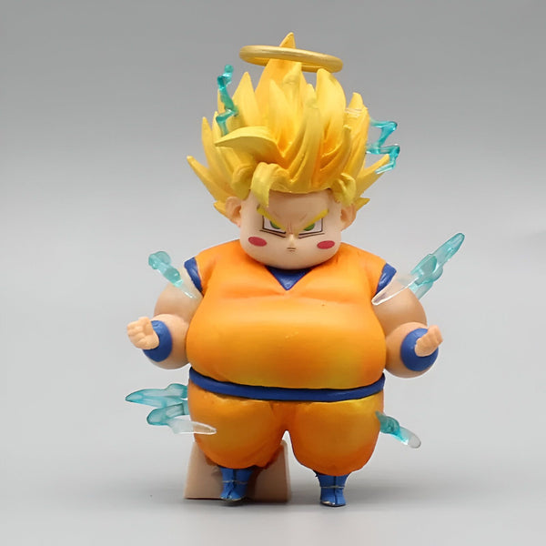 Une figurine en plastique de Son Goku, un personnage de la série animée Dragon Ball Z. Il est représenté avec les cheveux jaunes et les yeux bleus, et porte une combinaison orange et bleue. Il est en position de combat, avec les poings serrés et les jambes écartées.,FI-6459962774