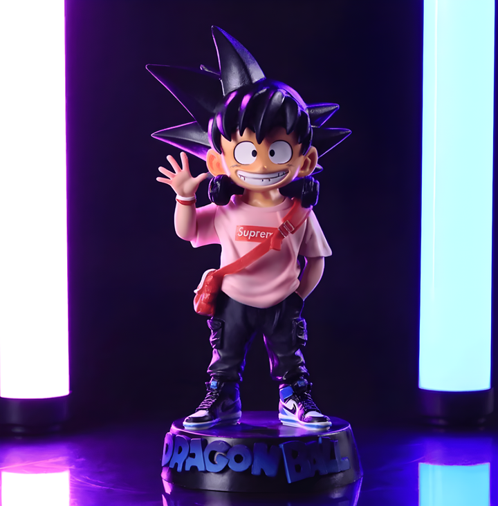 Une figurine de Son Goku, un personnage de Dragon Ball Z, portant des vêtements Supreme et des baskets Nike. Il est debout sur un socle noir et est éclairé par deux néons violets et bleus.,FI-5959386550