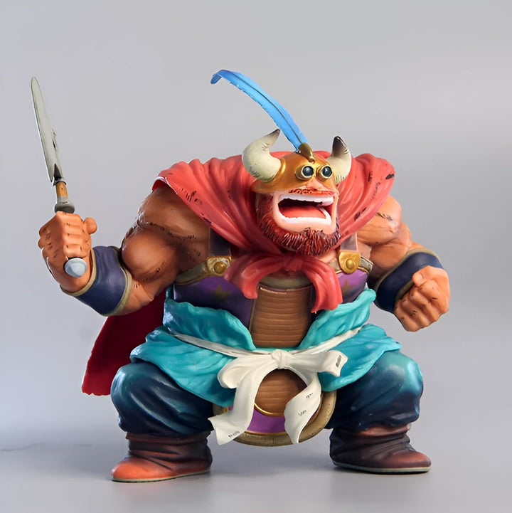 Une figurine de personnage de dessin animé japonais. Il est grand et musclé, avec une peau orange et des cheveux bleus. Il porte une armure et une cape rouges, et il tient une épée dans sa main droite.,FI-1439049823
