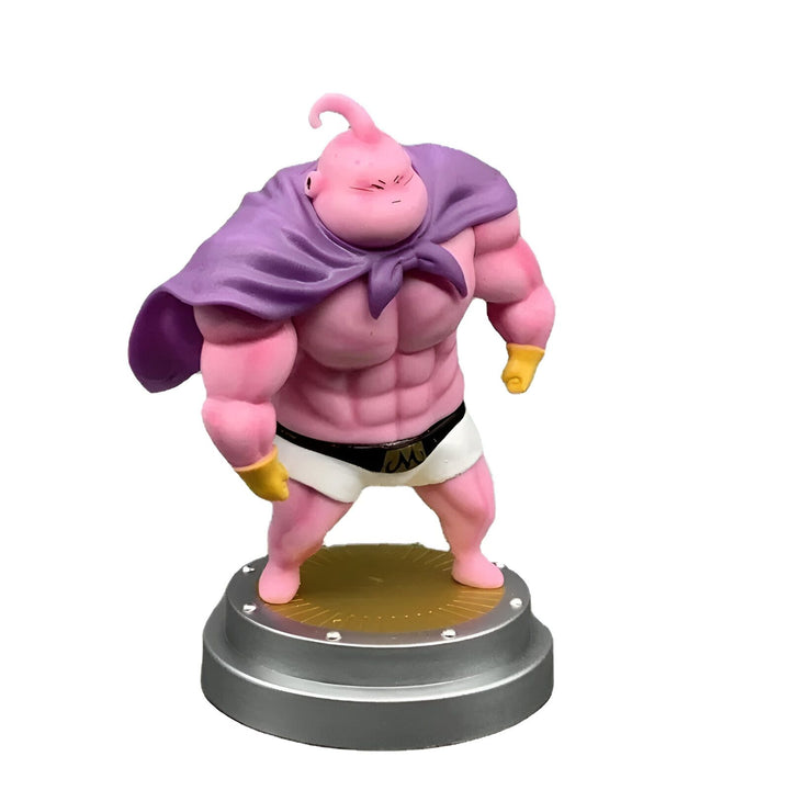 Une figurine de Majin Buu, un personnage de Dragon Ball Z. Il est représenté avec une musculature imposante, un pantalon blanc et une cape violette. Il se tient sur un socle doré et gris.,FI-7353755717