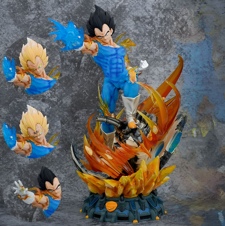 Une statue en résine de Vegeta, un personnage de la série Dragon Ball Z. Vegeta est représenté en train de se téléporter, avec un bras tendu vers l'avant et l'autre bras replié sur sa poitrine. Il est vêtu d'une combinaison bleue et blanche, et ses cheveux sont noirs. La statue est posée sur un socle orange et noir.,FI-511996463X