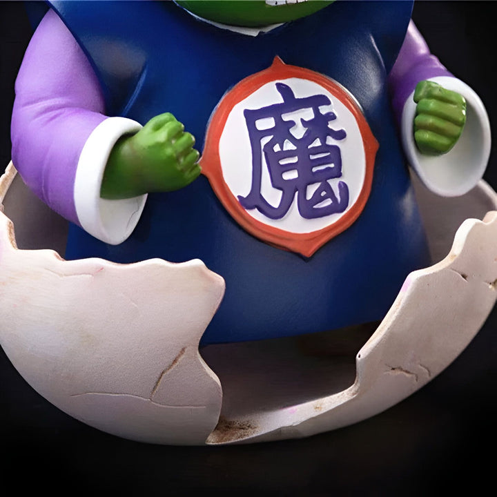 Une figurine de Piccolo, un personnage de Dragon Ball Z, sortant de son œuf. Il porte une cape violette et a les poings serrés.,FI-5962248058