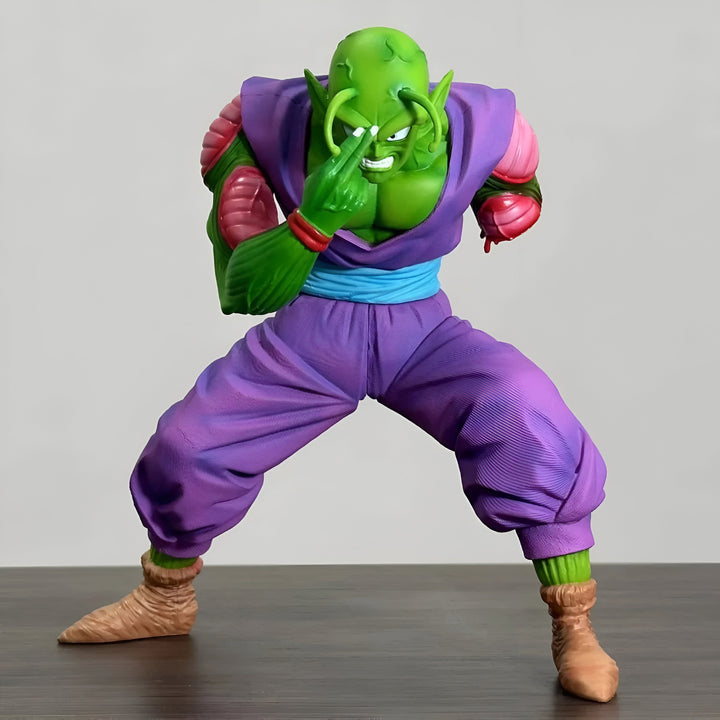 Une figurine de Piccolo, un personnage de Dragon Ball Z. Il est vêtu d'un pantalon violet et d'une ceinture bleue. Il a les cheveux verts et la peau verte. Il est en position de combat.,FI-3089395517
