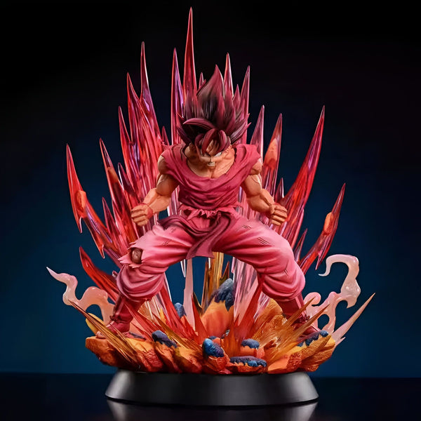 Une statue en résine de Son Goku, un personnage de la série animée Dragon Ball Z. Il est représenté en pleine action, avec les cheveux rouges et les yeux bleus. Il est entouré d'un socle enflammé.,FI-3386124755