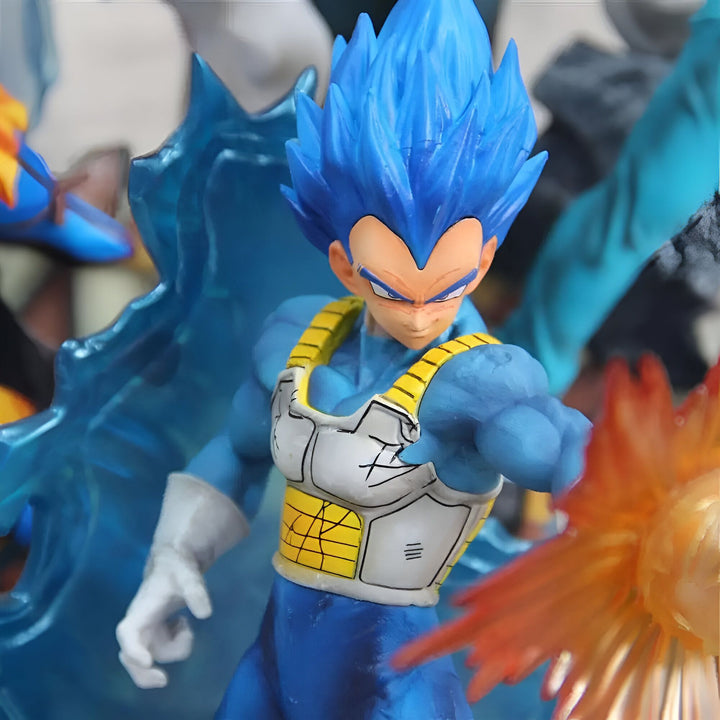 Une figurine de Vegeta, un personnage de Dragon Ball Z, avec ses cheveux bleus et sa combinaison bleue et jaune. Il est en position de combat, avec un poing en avant et l'autre poing fermé près de son visage. Il y a un effet de mouvement autour de lui, avec des lignes bleues et jaunes qui suggèrent qu'il est en train de se téléporter.,FI-9352254848