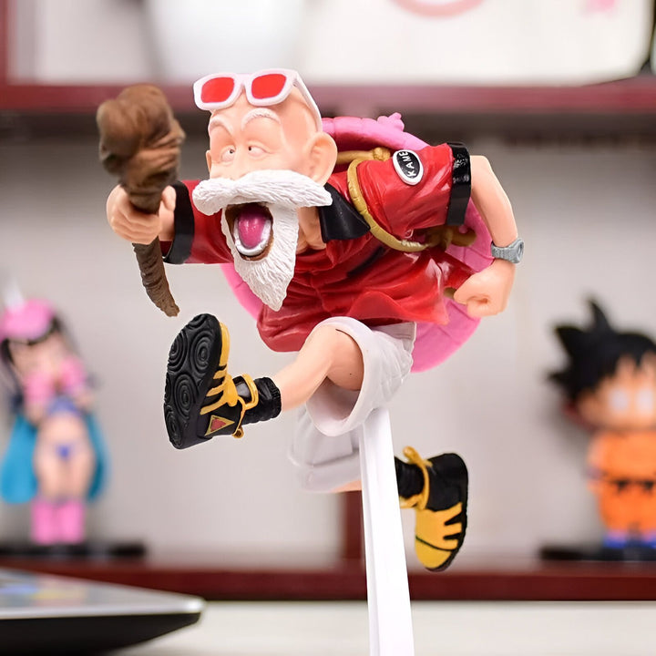 Une figurine de M. Roshi, un personnage de Dragon Ball Z. Il est représenté en train de courir, avec un bâton dans la main et un sac à dos sur le dos. Il porte des lunettes de soleil et une chemise rouge.,FI-7127817340