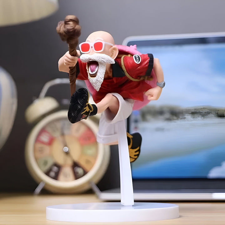 Une figurine de Roshi, un personnage de Dragon Ball, en train de voler. Il porte une tenue orange et des lunettes de soleil rouges. Il a une barbe blanche et un bâton à la main.,FI-7127817340
