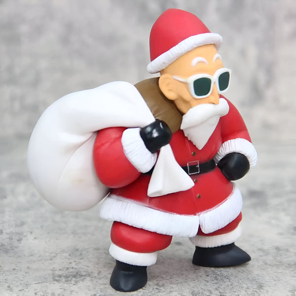 Une figurine de collection représentant le personnage de Maître Roshi de la série Dragon Ball Z. Il porte un costume de Père Noël rouge et blanc et des lunettes de soleil. Il porte un sac rempli de cadeaux sur son épaule.,FI-5075916473