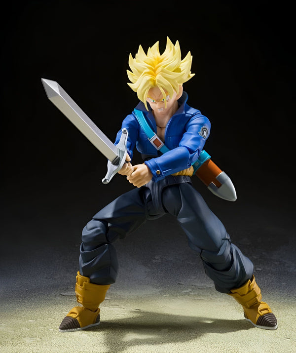 Une figurine de Trunks du futur, un personnage de Dragon Ball Z. Il est vêtu d'une veste bleue et d'un pantalon noir. Il tient une épée dans sa main droite.,FI-2109705310