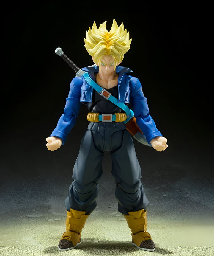 Une figurine de Trunks du futur, un personnage de Dragon Ball Z. Il est vêtu d'une veste bleue, d'un pantalon noir et de bottes jaunes. Il a une épée à la hanche et un regard déterminé sur le visage.,FI-2109705310