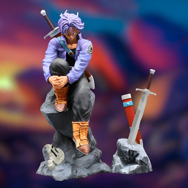 Une figurine de Trunks du futur, un personnage de Dragon Ball Z, assis sur un rocher, tenant son épée dans sa main droite et portant une veste violette et un pantalon noir.,FI-7573487673