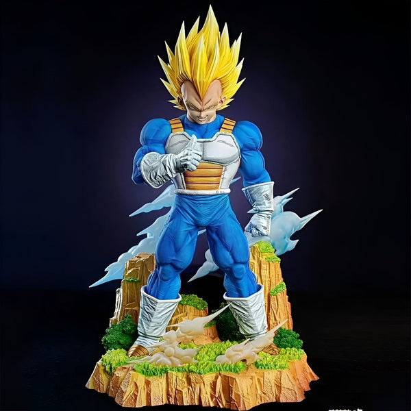 Une statue en résine de Vegeta, un personnage de la série Dragon Ball Z. Vegeta est représenté dans sa tenue de combat bleue et jaune, avec ses cheveux blonds hérissés. Il est debout sur un socle rocheux, et semble prêt à se battre.,FI-7981590639