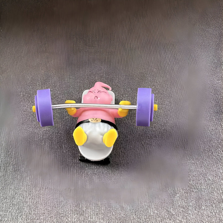 Une figurine de Majin Buu, un personnage de Dragon Ball Z, en train de soulever des poids. Il est assis sur un banc et porte une combinaison de sport.,FI-9424726554