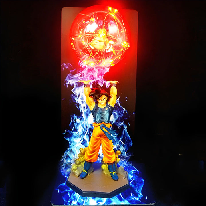 Une figurine de Son Goku en train de charger un Genkidama. La figurine est éclairée par une lumière rouge et est entourée de flammes bleues.,LA-3134525771